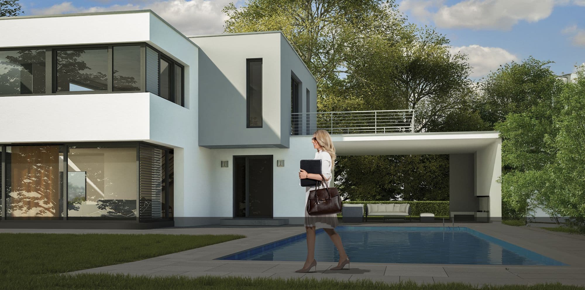 Drita Kaußen-Behramaj vor einer modernen Villa mit Pool