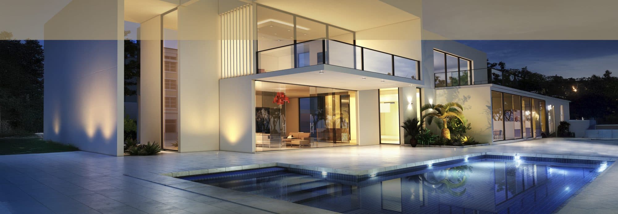 Beleuchtete moderne Villa mit Pool bei Nacht